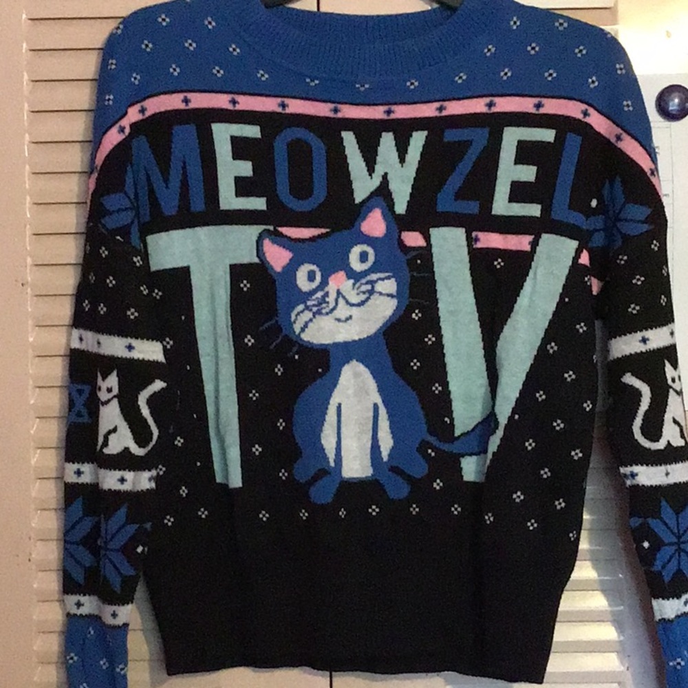 Cute “Meowzel Tov” sweater